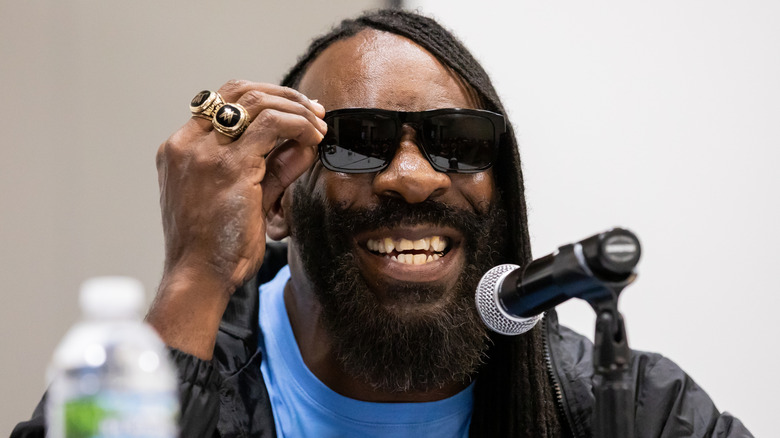 Booker T hosts a panel at Motor City Comic Con in 2022.