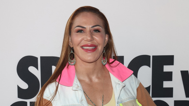 Cristiane 'Cyborg' Justino smiles on a 2023 red carpet.