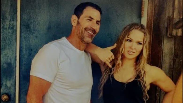 Ronda Rousey poses with then-manager Darin Harvey.