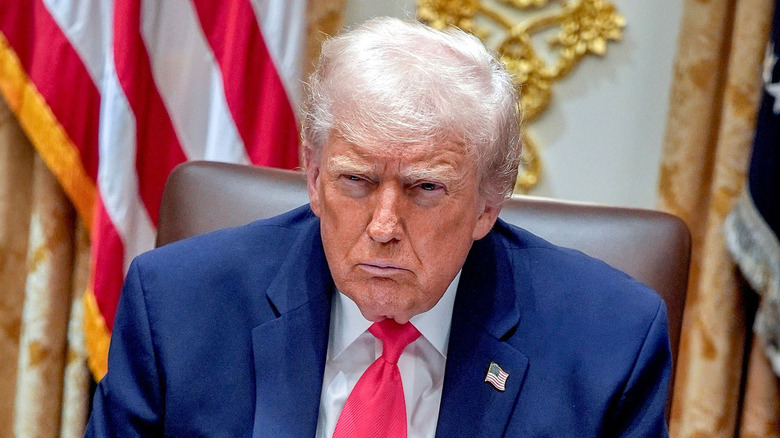 Donald Trump scowls in the Oval Office in 2025.