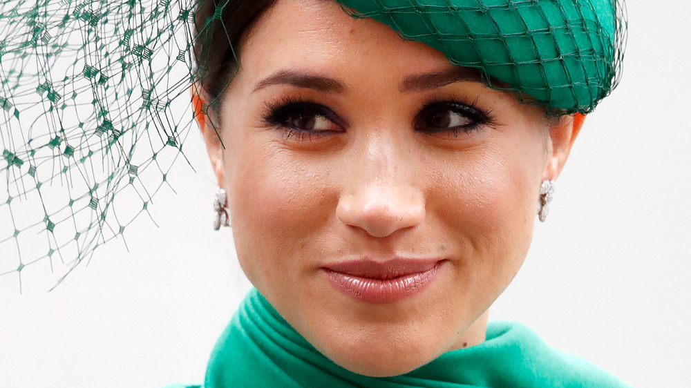 Meghan Markle soft-smiling