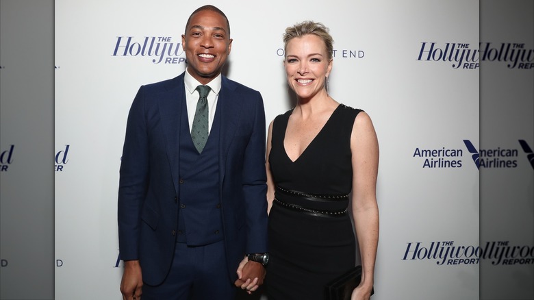 Megyn Kelly and Don Lemon smiling while posing together at an event