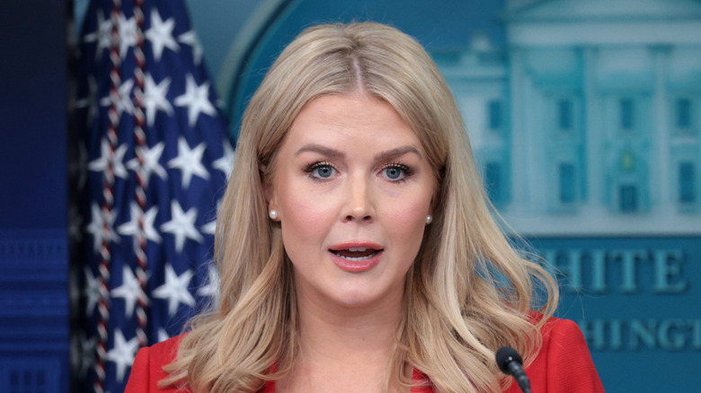 Karoline Leavitt wearing a red blazer