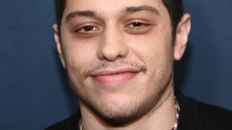 Pete Davidson smiling black shirt