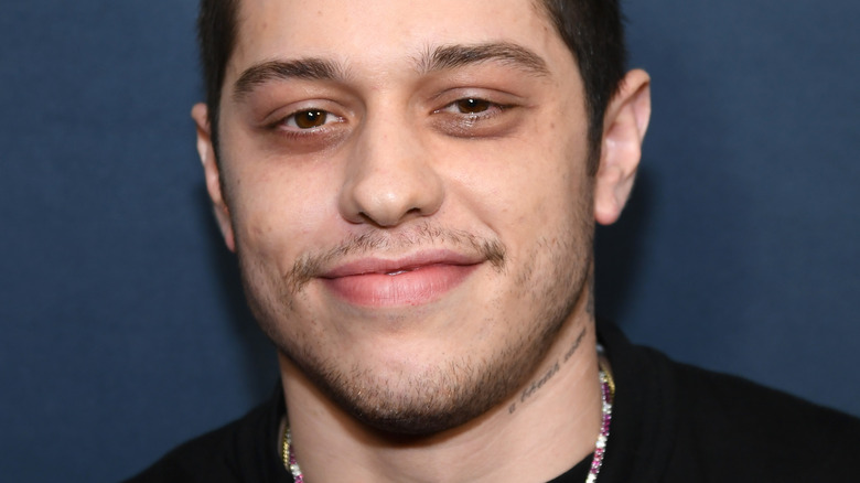 Pete Davidson smirking 