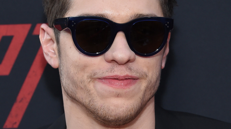 Pete Davidson wearing shades