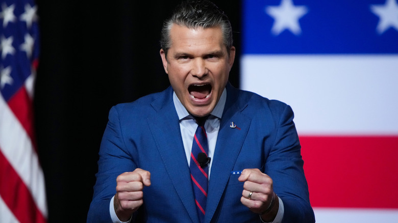 Pete Hegseth speaking animatedly on stage.