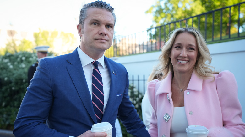 Pete Hegseth and his wife posing at the 2026 White House Easter Egg Roll