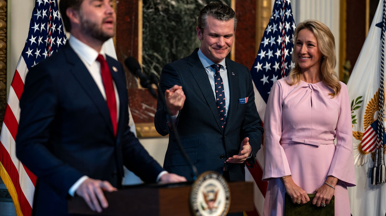 Pete and Jennifer Hegseth look on as JD Vance speaks at the former's swearing-in ceremony.