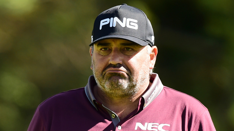 Angel Cabrera wearing black hat