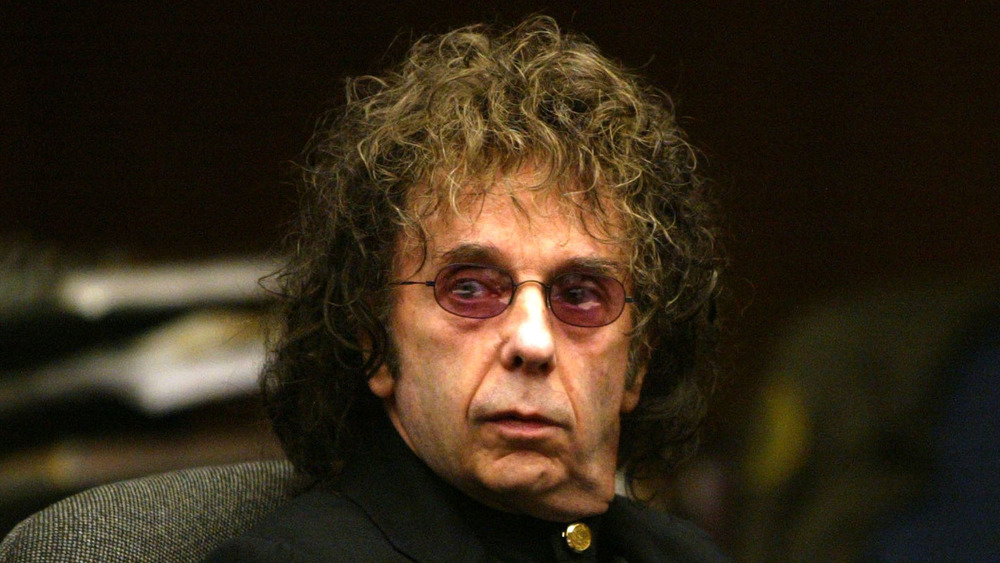 Phil Spector in glasses