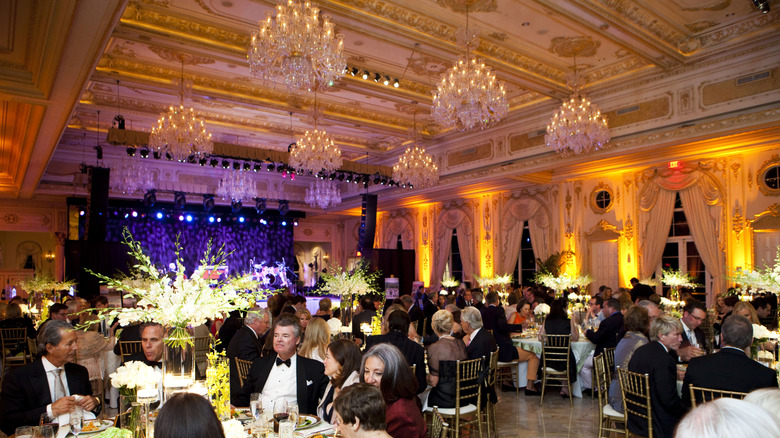 Diners eating in the Mar-a-Lago ballroom