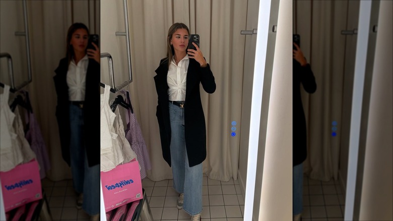 Kai Trump posing in front of a mirror