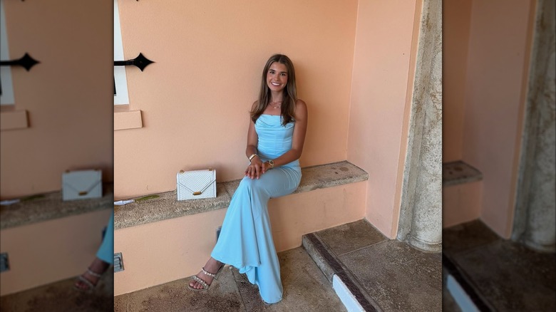 Kai Trump in a blue dress