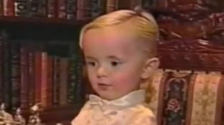 Prince Michael Jackson plays chess with his father as a child in a home video
