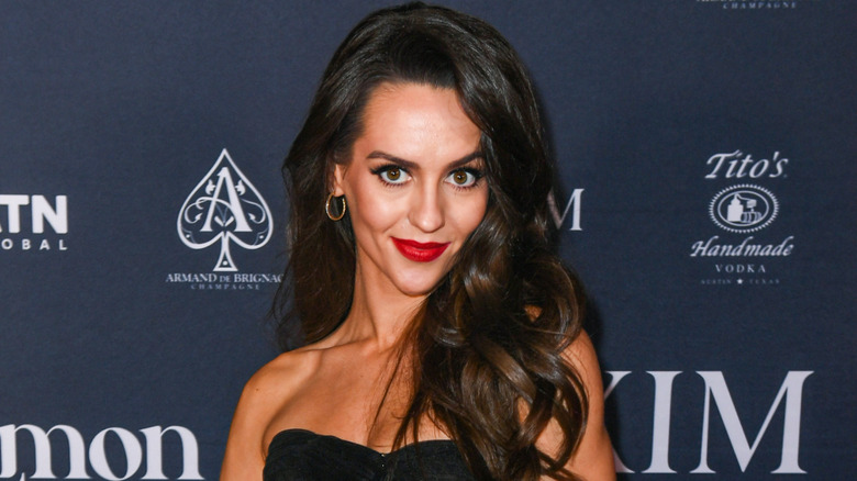 Jordon Hudson posing at Maxim event