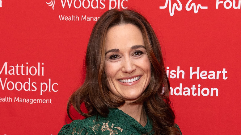 Pippa Middleton poses in green dress