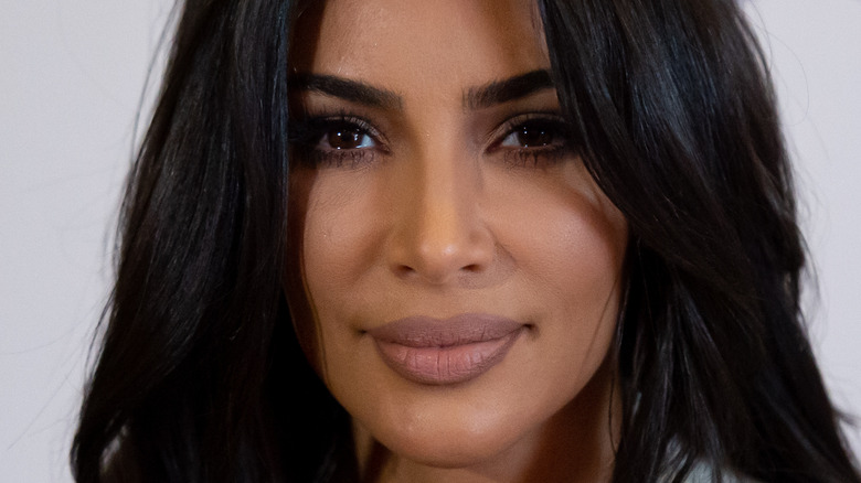 Kim Kardashian hair in face
