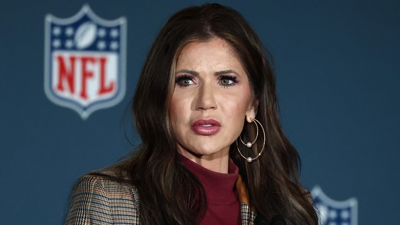Kristi Noem looks on during a press conference in Port Everglades, FL (2025)
