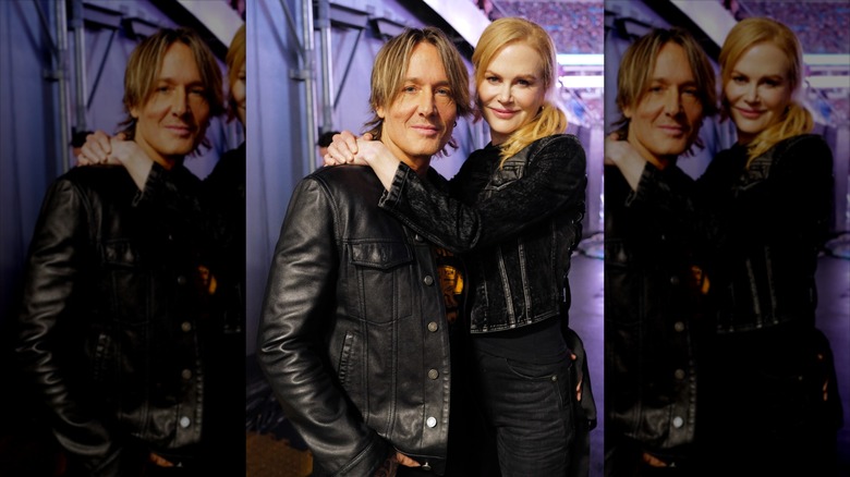 Nicole Kidman with her arms around Keith Urban