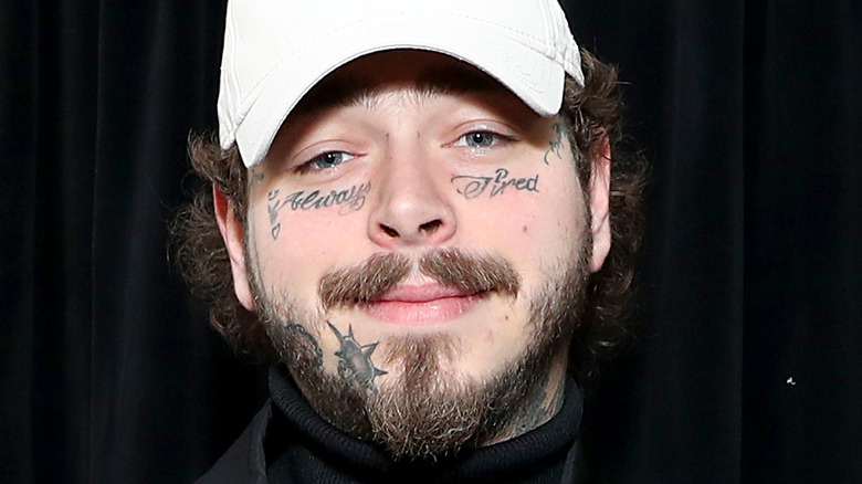 Post Malone smiling