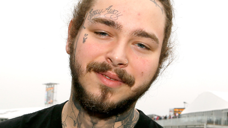 Post Malone posing