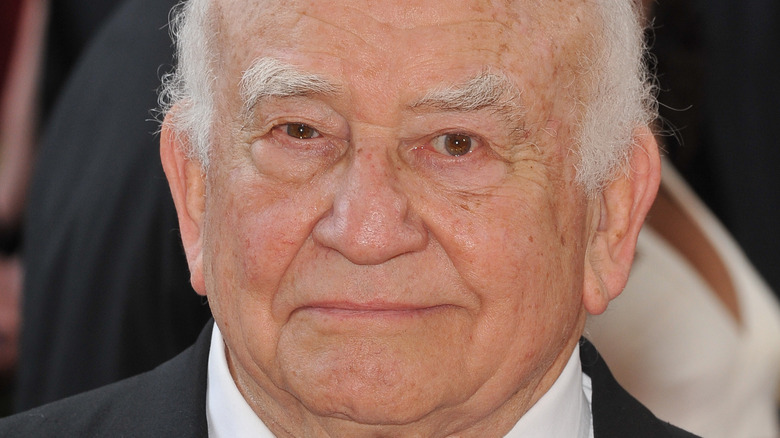 Ed Asner slightly smiling