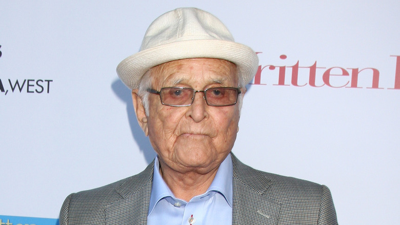 Norman Lear wearing a white hat