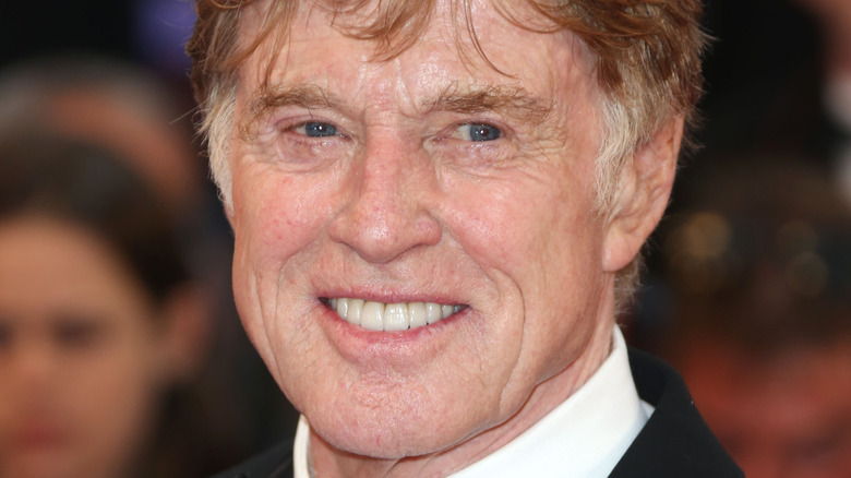 Robert Redford smiling and looking to the side