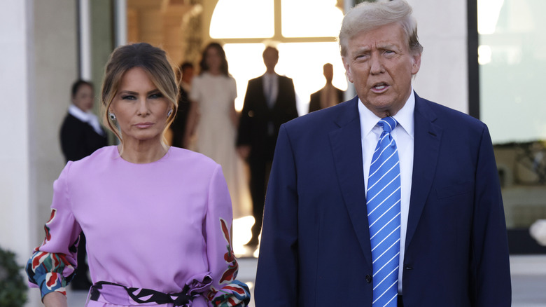 Melania Trump and Donald Trump walking