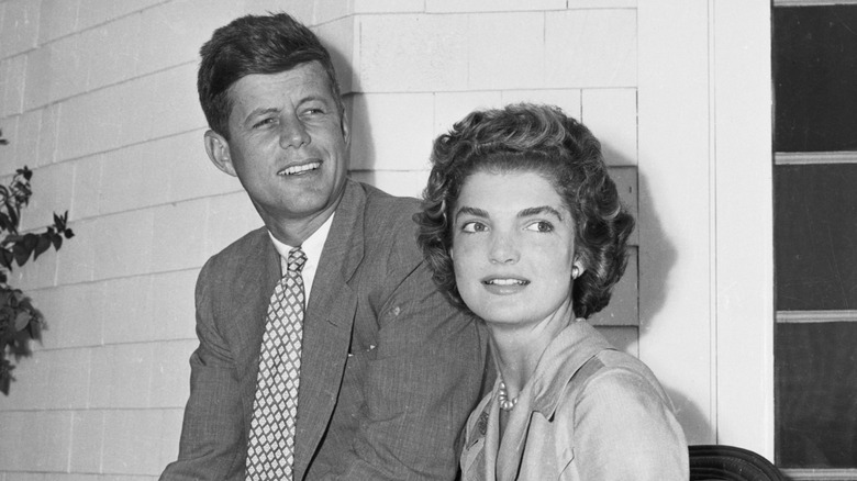 John F. Kennedy and Jacqueline Lee Bouvier sitting together