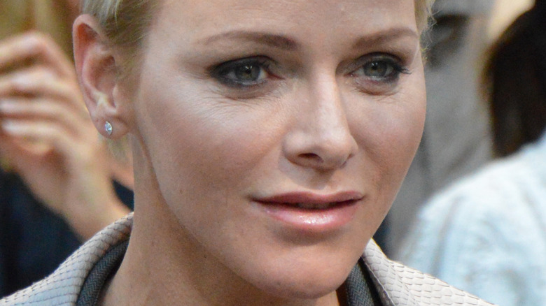 Princess Charlene looking away