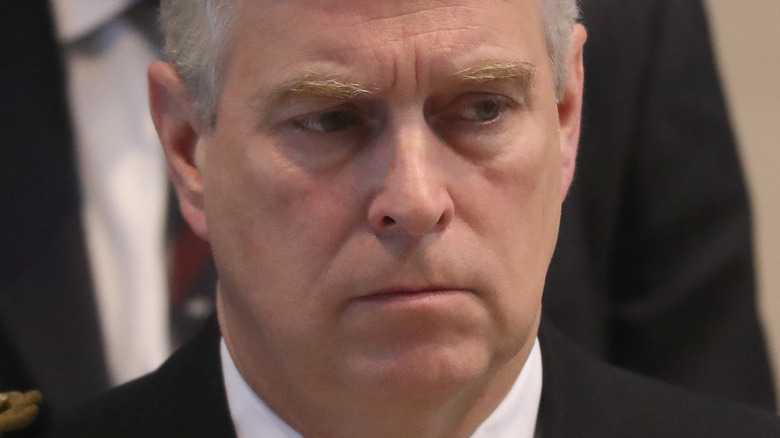 Prince Andrew frowning