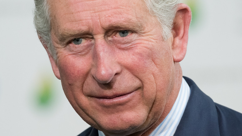 Prince Charles grimacing
