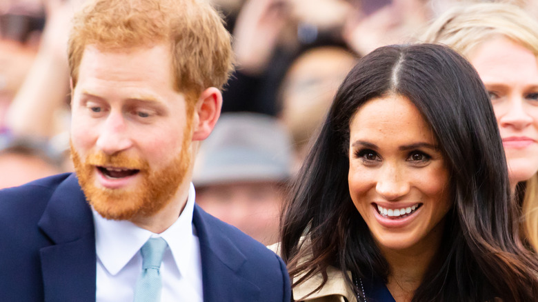 Prince Harry and Meghan Markle smiling