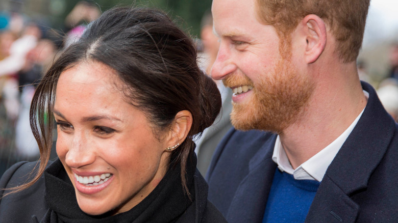 Meghan Markle and Prince Harry smiling