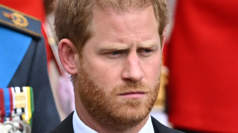 Prince Harry frowning