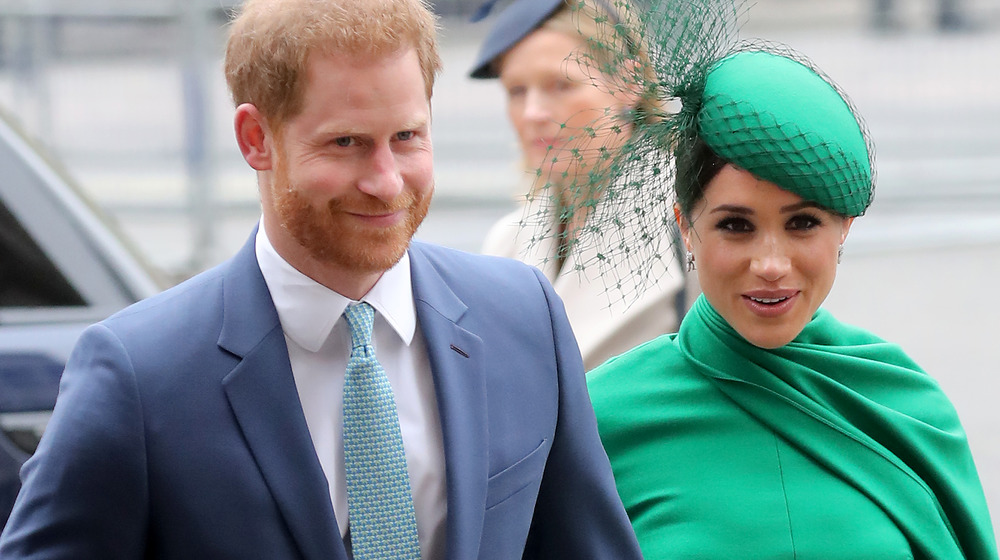 Prince Harry with Meghan Markle at an event