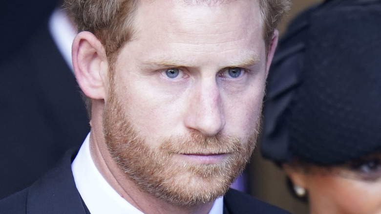 Prince Harry looking grim