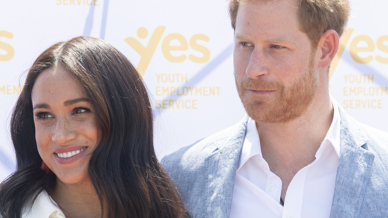 Meghan Markle and Prince Harry posing