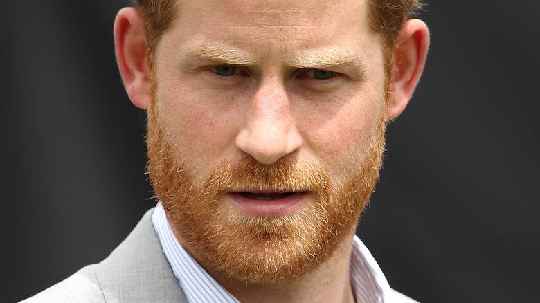 Prince Harry solemn