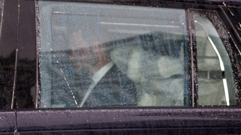 Prince Harry riding in a car, looking sad in London, England (2025)