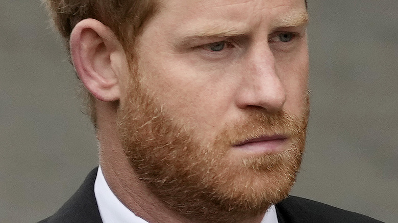 Prince Harry with a neutral expression