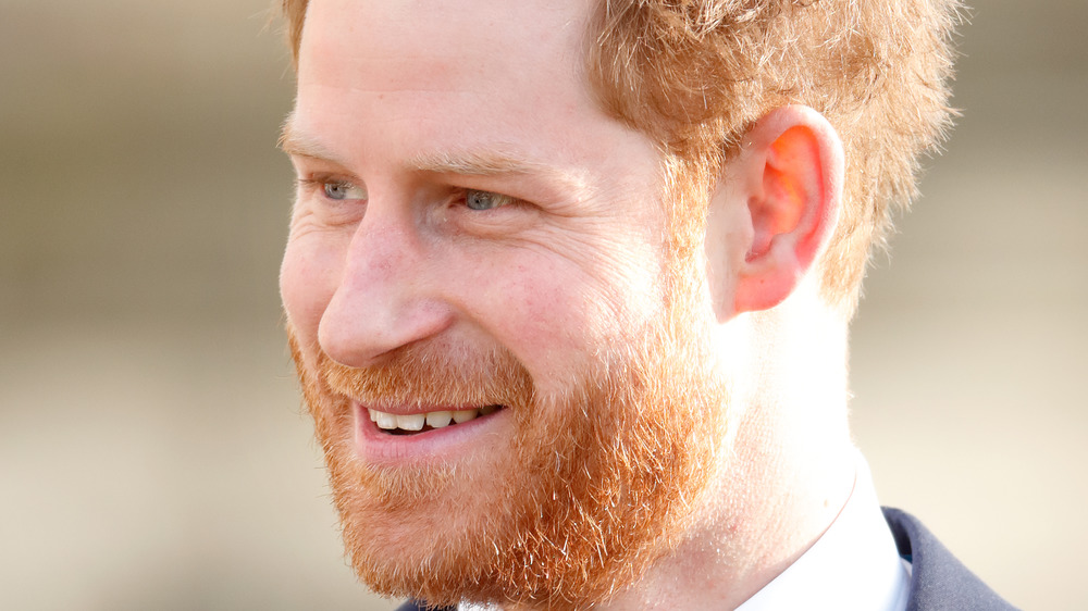 Prince Harry walking outside