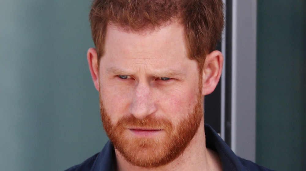 Prince Harry stares off into the distance