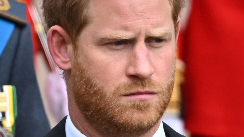 Prince Harry frowning