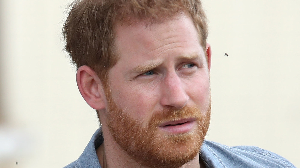 Prince Harry with a serious expression