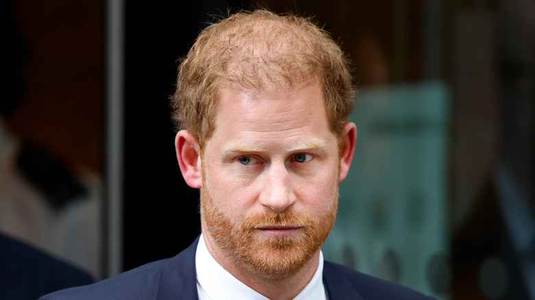 Prince Harry looking serious in close-up