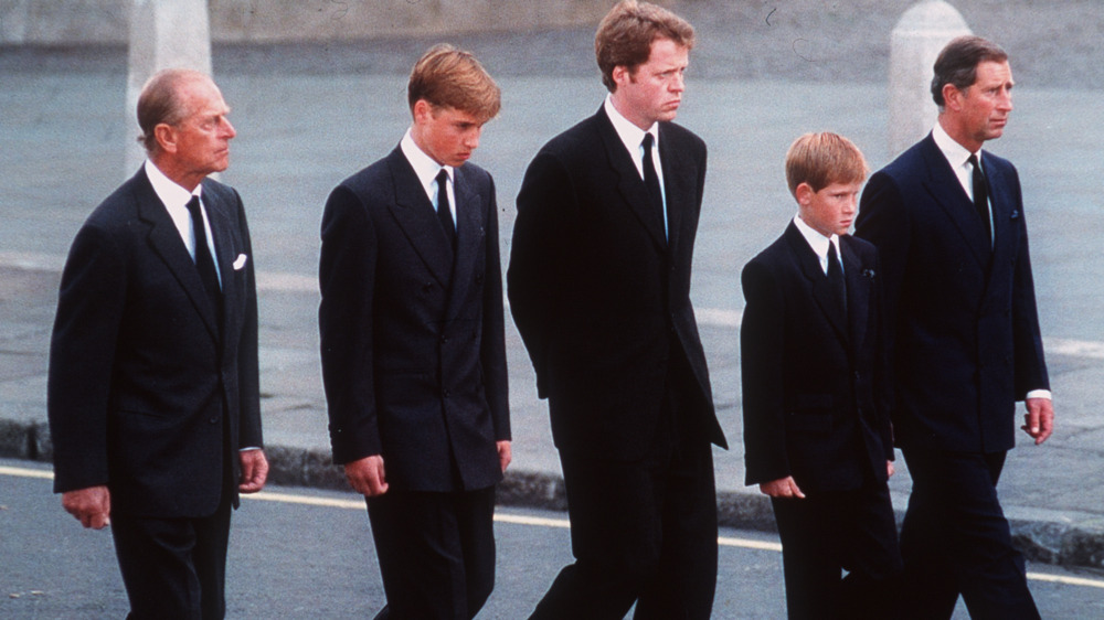 Prince Philip, Prince William, Diana's brother ﻿Earl Spencer, Prince Harry, and Prince Charles walking behind Diana's coffin 