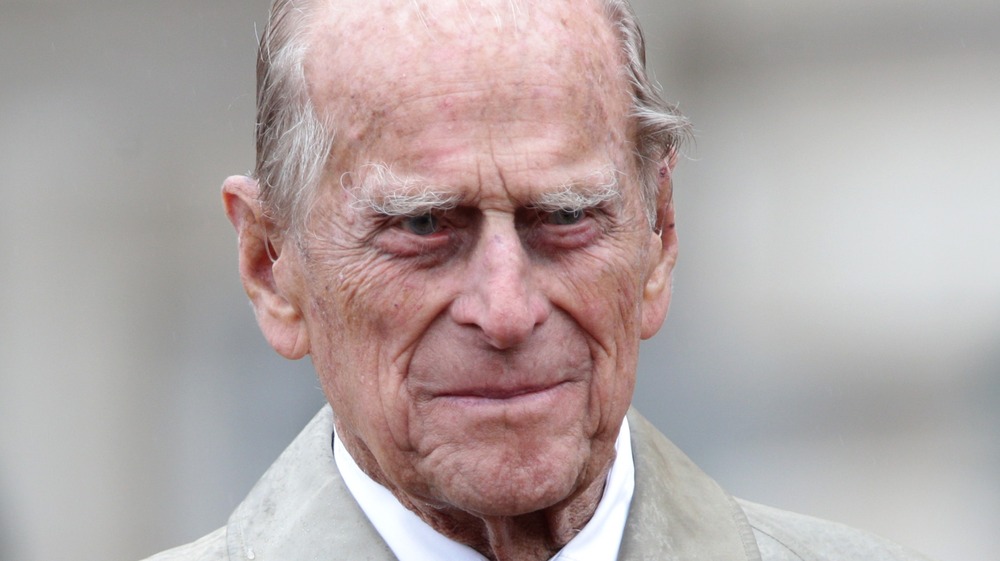 Prince Philip gives a slight grin when he was at a public event